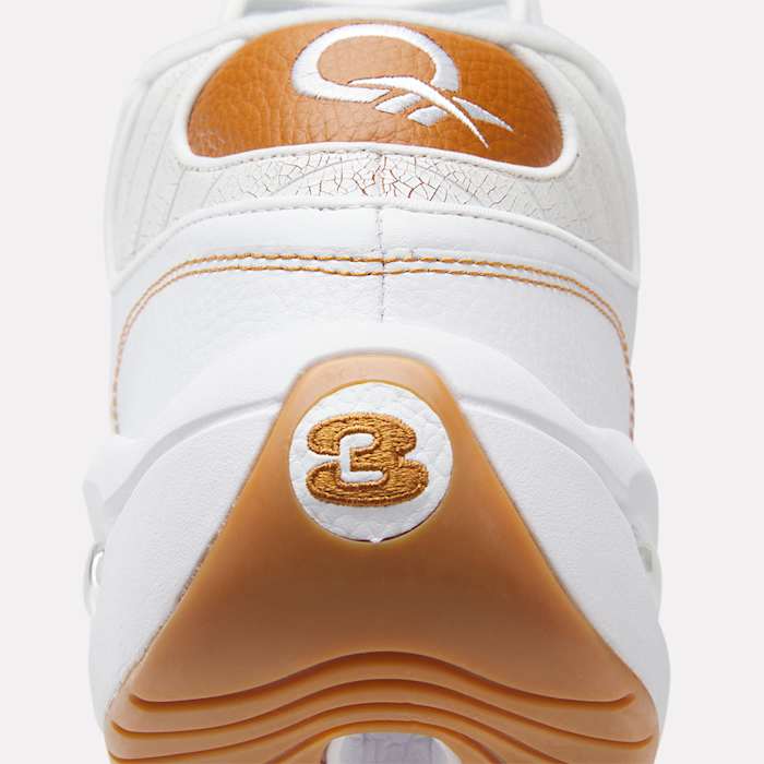 Rear view of Allen Iverson's white and brown Reebok sneakers.